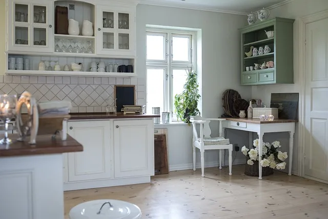 Do kitchen cabinets go on top of tile?