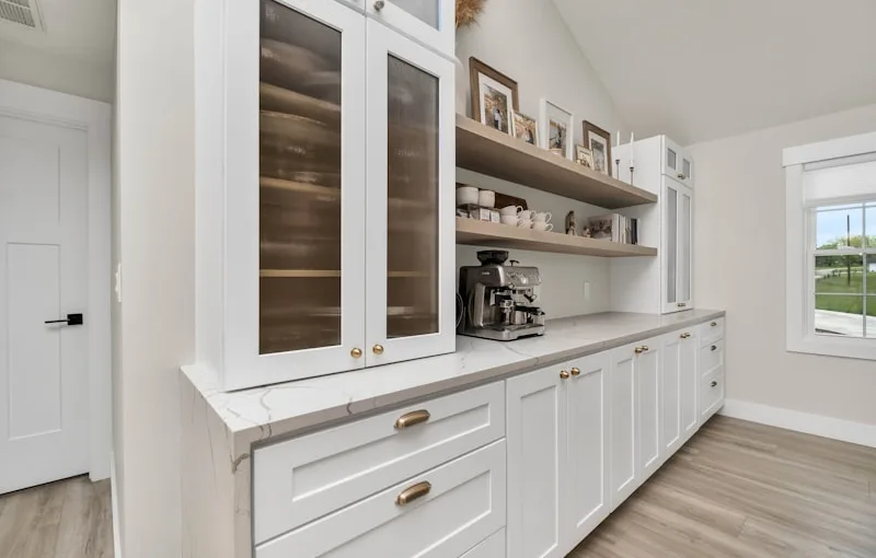 How much space between kitchen island and cabinets?