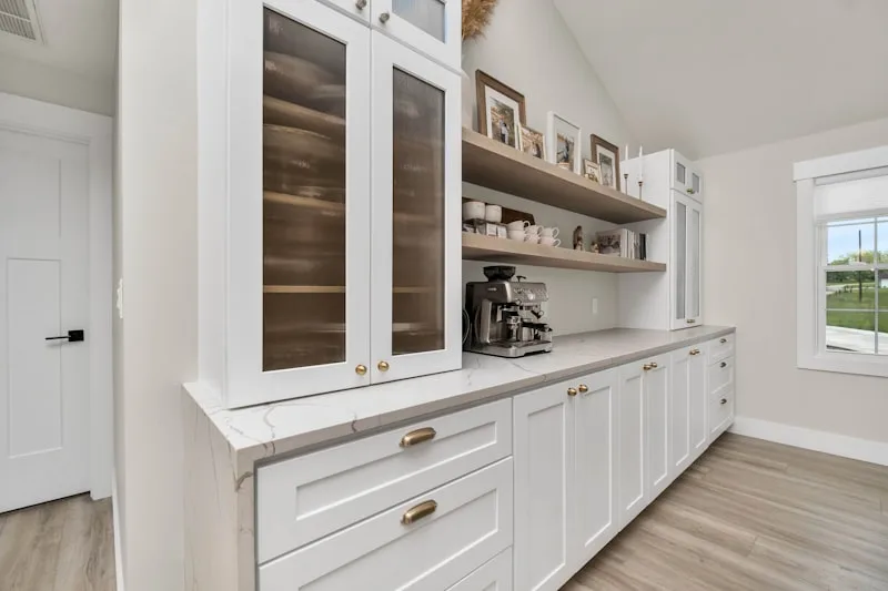 How much space between kitchen island and cabinets?