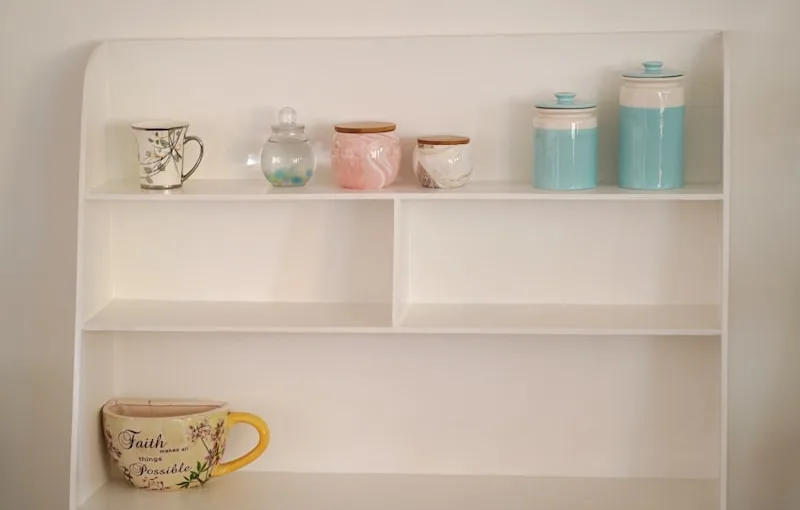 Why do kitchen cabinets have wasted space under the counter?